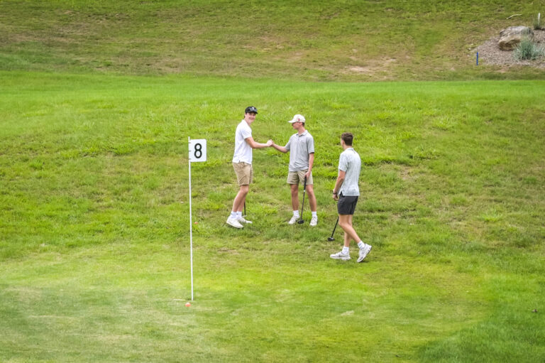 Group of people enjoying park golf on a sunny day at the 1Club in Vernon, New Jersey, as a concept of park golf game and experience at 1Club Vernon, NJ.