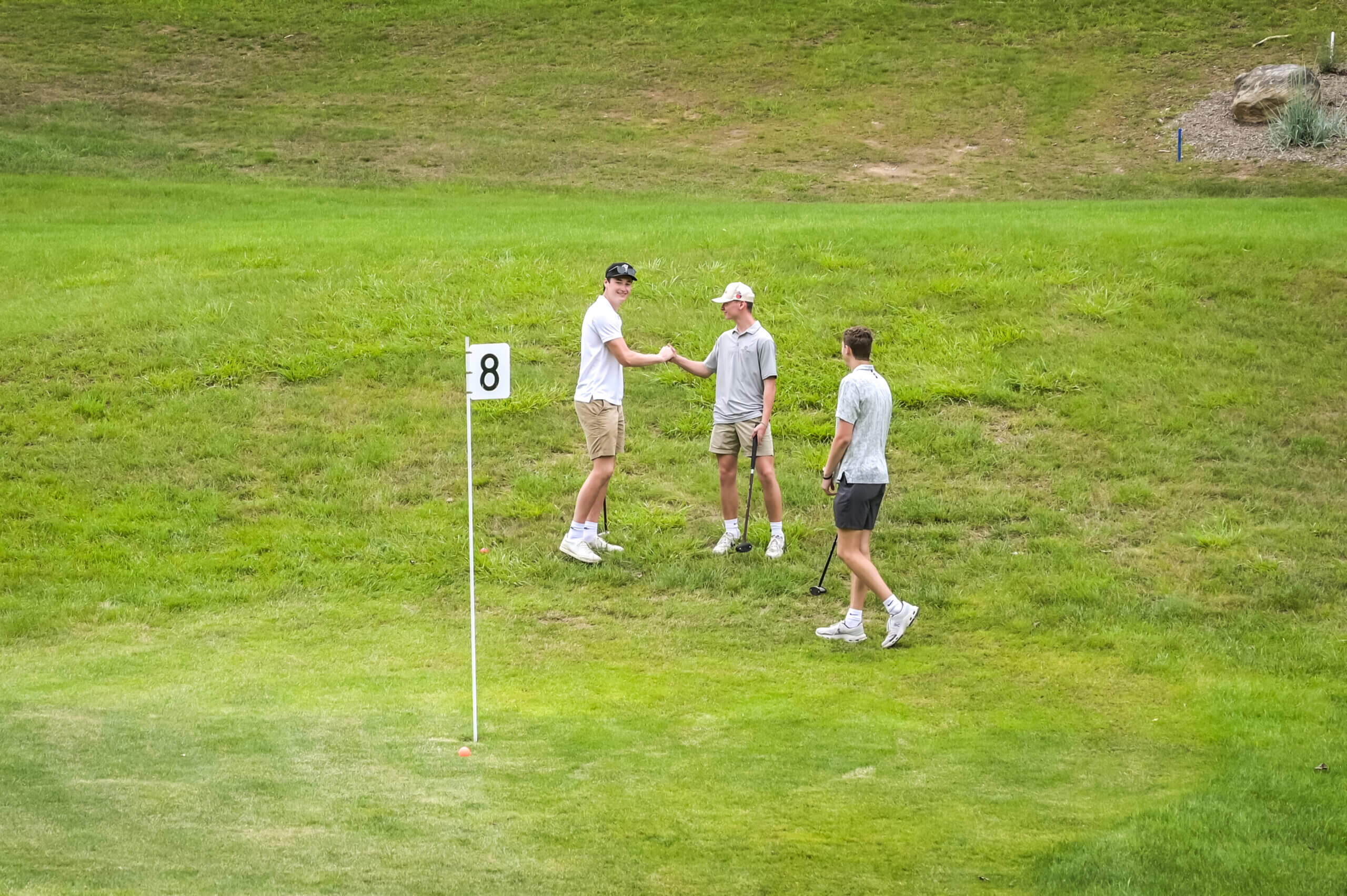 Group of people enjoying park golf on a sunny day at the 1Club in Vernon, New Jersey, as a concept of park golf game and experience at 1Club Vernon, NJ.